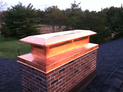 Before and after chimney cap replacement in Jericho, NY